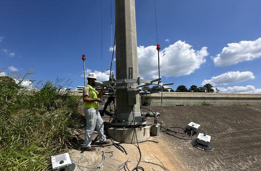High-mast ring lowered for service