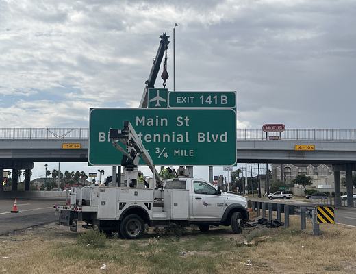 Overhead sign lighting