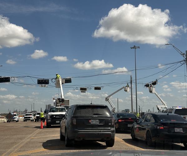 Span-wire signal rebuild, three bucket trucks
