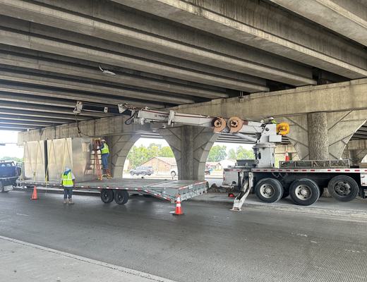 Work under a freeway bridge