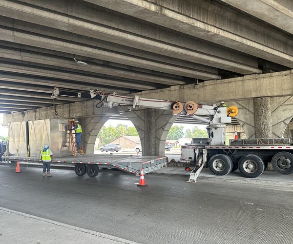 Work under a freeway bridge